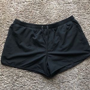 Black soft shorts from the brand Kona Sol